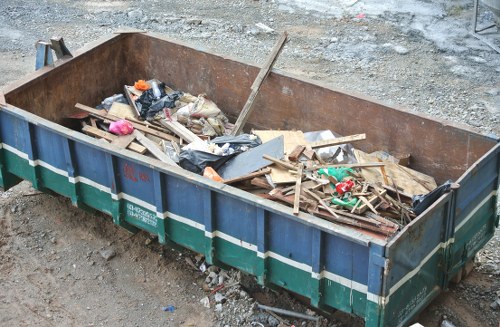 People organizing furniture for clearance in Forestgate