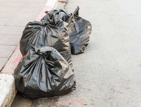 Forestgate community park clean with waste removal trucks